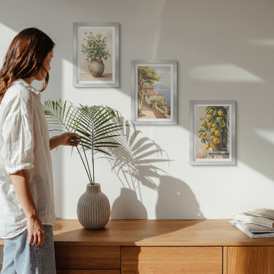 Photo frame wall Flowers in a vase with a view of the sea and lemons