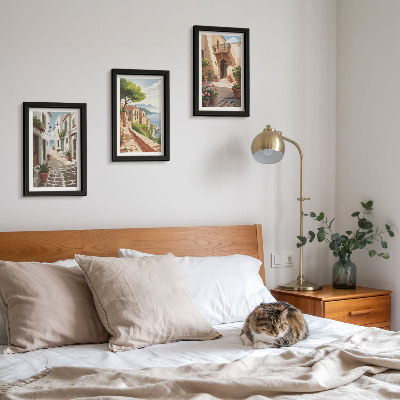 Photo frame wall Picturesque streets with houses and potted plants