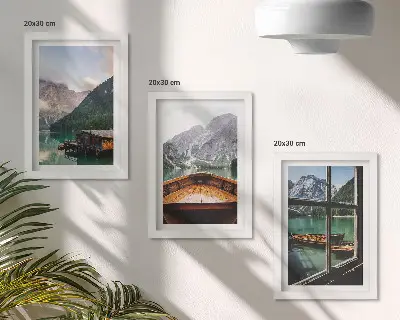 Mountain lake with a boat and wooden houses framed triptych