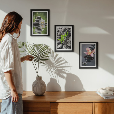 Photo frame wall A peaceful zen composition of stones and flowers on water