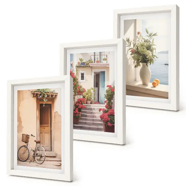 Charming seaside streets with flowers and bicycles framed triptych