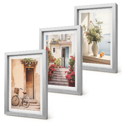 Framed triptych Charming seaside streets with flowers and bicycles