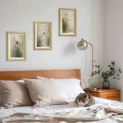 Painted grasses with dragonflies above the water framed triptych