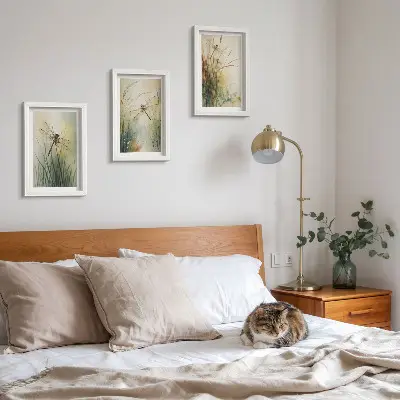 Painted grasses with dragonflies above the water framed triptych