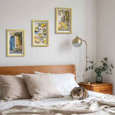 Photo frame wall featuring lemons, lemonade, blue doors, and summer views