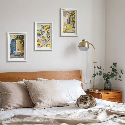 Photo frame wall featuring lemons, lemonade, blue doors, and summer views