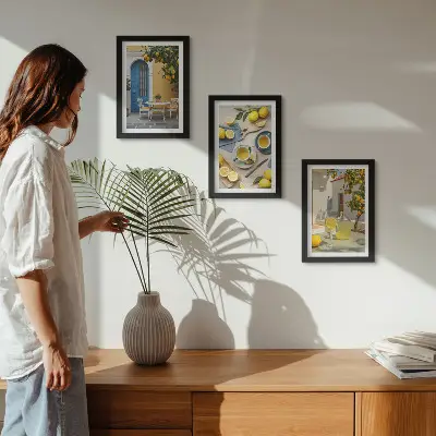 Photo frame wall featuring lemons, lemonade, blue doors, and summer views