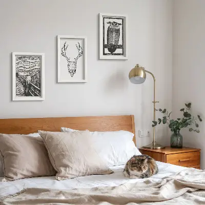Photo frame wall featuring a graphic Scream-inspired skull and owl illustration