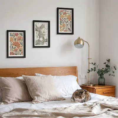 Floral patterns in shades of orange and green framed triptych