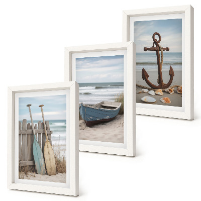 Photo frame wall A beach with a rowboat and an anchor in the sand