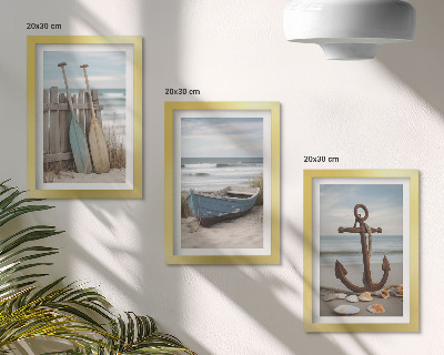 Photo frame wall A beach with a rowboat and an anchor in the sand