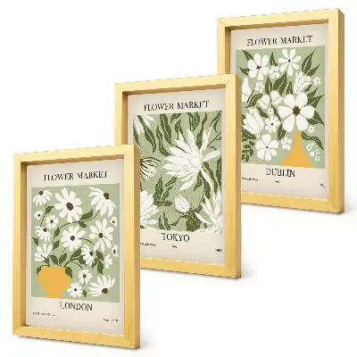 Photo frame wall with floral poster designs featuring London, Tokyo, and Dublin