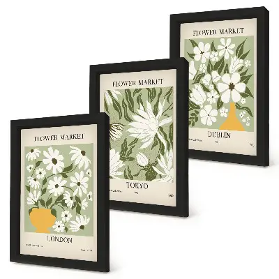 Photo frame wall with floral poster designs featuring London, Tokyo, and Dublin