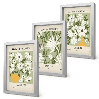 Photo frame wall with floral poster designs featuring London, Tokyo, and Dublin