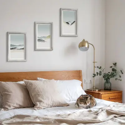 Minimalist mountain triptych in delicate pastels, framed