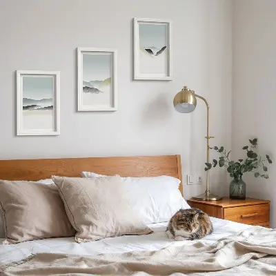 Minimalist mountain triptych in delicate pastels, framed