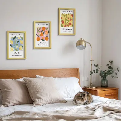 Photo frame wall gallery set with fruit posters featuring lemons, oranges, and strawberries