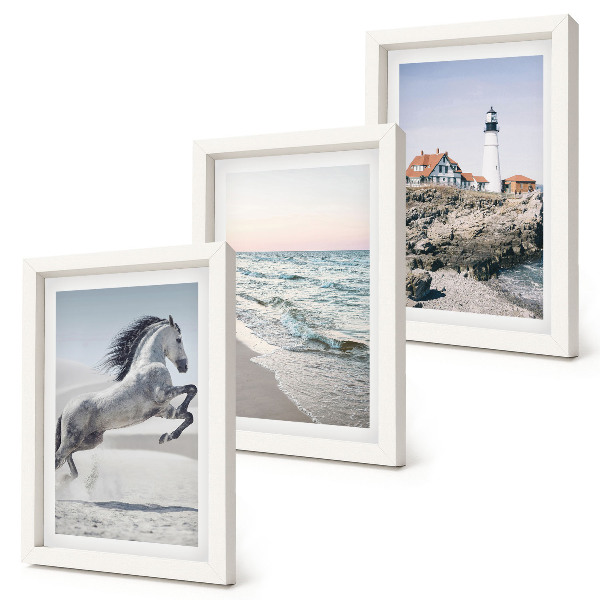 Photo frame wall Horses in motion beach and lighthouse water waves