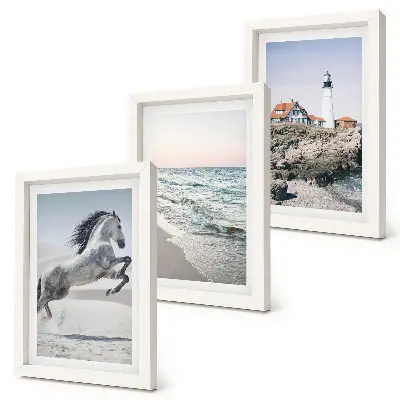 Photo frame wall set horses in motion on the beach with a lighthouse and water waves