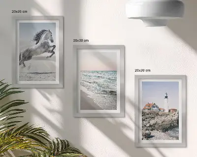 Photo frame wall set horses in motion on the beach with a lighthouse and water waves