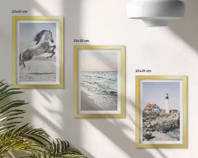 Photo frame wall set horses in motion on the beach with a lighthouse and water waves