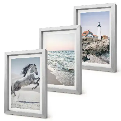 Photo frame wall set horses in motion on the beach with a lighthouse and water waves