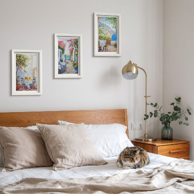 Framed triptych Charming streets with flowering plants and sea views