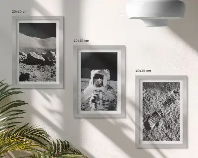 Photo frame wall set featuring moon photography with an astronaut and footprint