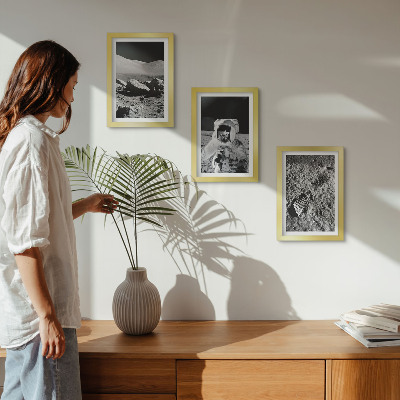 Photo frame wall Moon photos with astronaut and footprint
