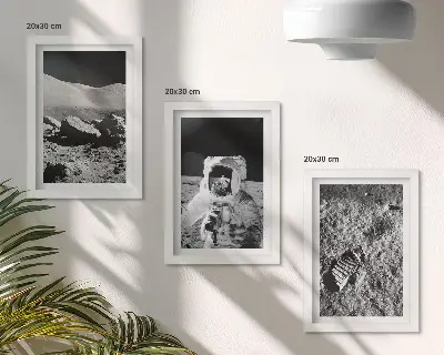 Photo frame wall set featuring moon photography with an astronaut and footprint
