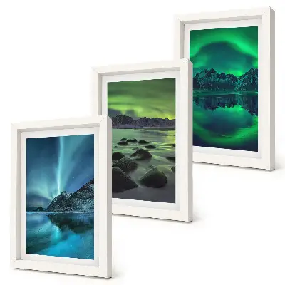 Photo frame wall with a winter landscape featuring northern lights and mountains