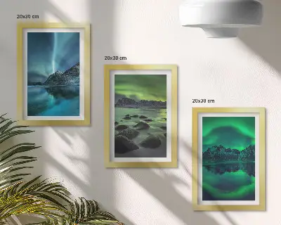 Photo frame wall with a winter landscape featuring northern lights and mountains