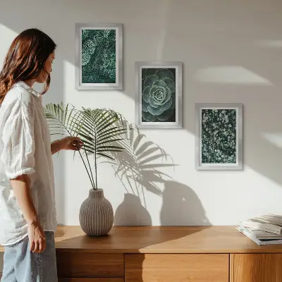 Photo frame wall art with green succulent leaves and delicate twigs