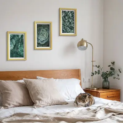 Photo frame wall art with green succulent leaves and delicate twigs