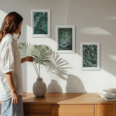 Photo frame wall art with green succulent leaves and delicate twigs