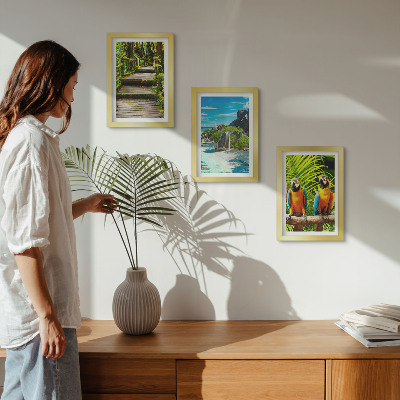 Photo frame wall Tropical forest with a waterfall and colorful parrots