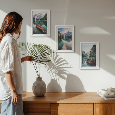 3-piece wall art set A lake in the mountains with boats and a wooden hut