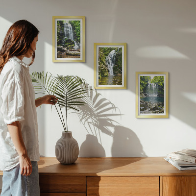 Photo frame wall Waterfalls in a green setting with stones and water