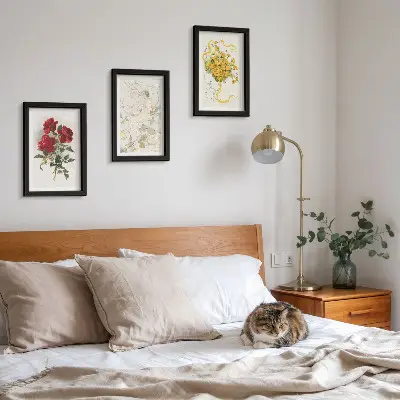 Photo frame wall with red roses, white figure, and yellow flowers in a vase
