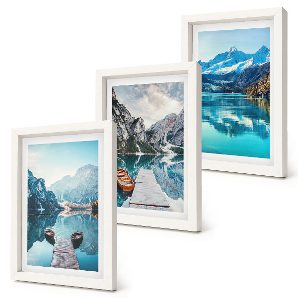 Framed triptych Mountain lakes with boats and reflections in the water