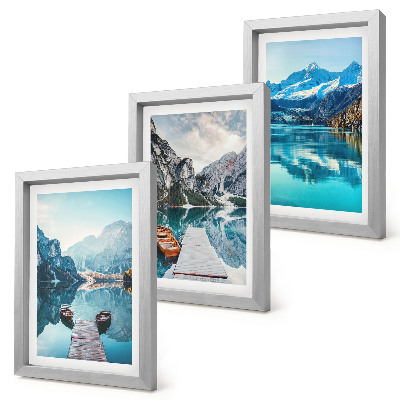 Framed triptych Mountain lakes with boats and reflections in the water
