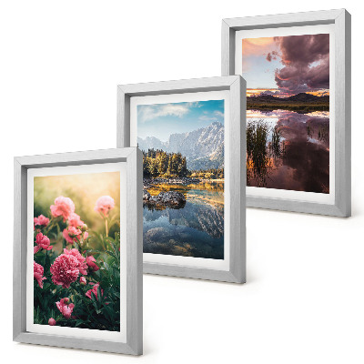 Photo frame wall Flowers in the garden, mountains and a calm surface of water