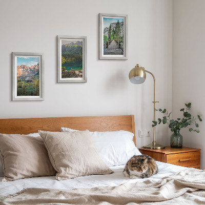 Framed triptych Mountain landscapes with a lake and a wooden pier