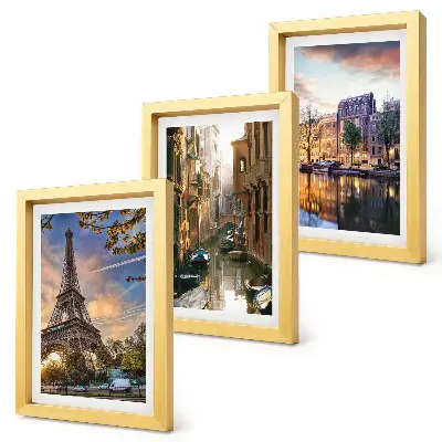 Photo frame wall featuring the Eiffel Tower, the canals of Venice, and the streets of Amsterdam