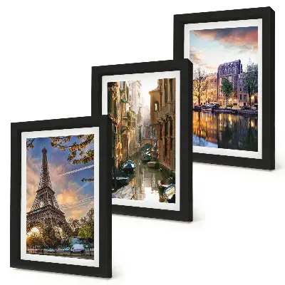 Photo frame wall featuring the Eiffel Tower, the canals of Venice, and the streets of Amsterdam