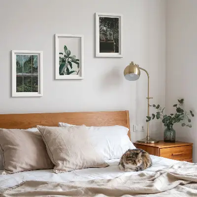Green leaves on the window and plants inside framed triptych