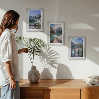Framed triptych Mountains, lakes and wooden bridges over the water