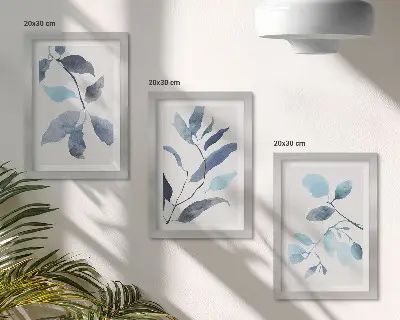 Framed triptych blue leaves on a light background in watercolor style