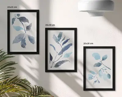 Framed triptych blue leaves on a light background in watercolor style