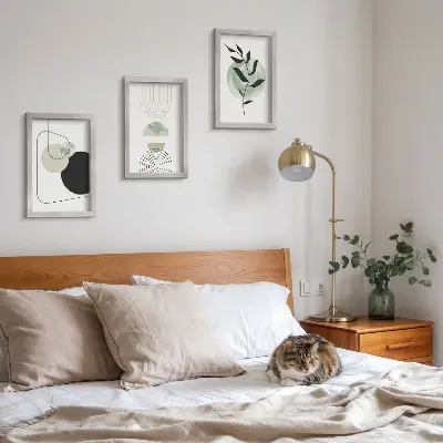 Photo frame wall gallery with abstract shapes and green plant motifs